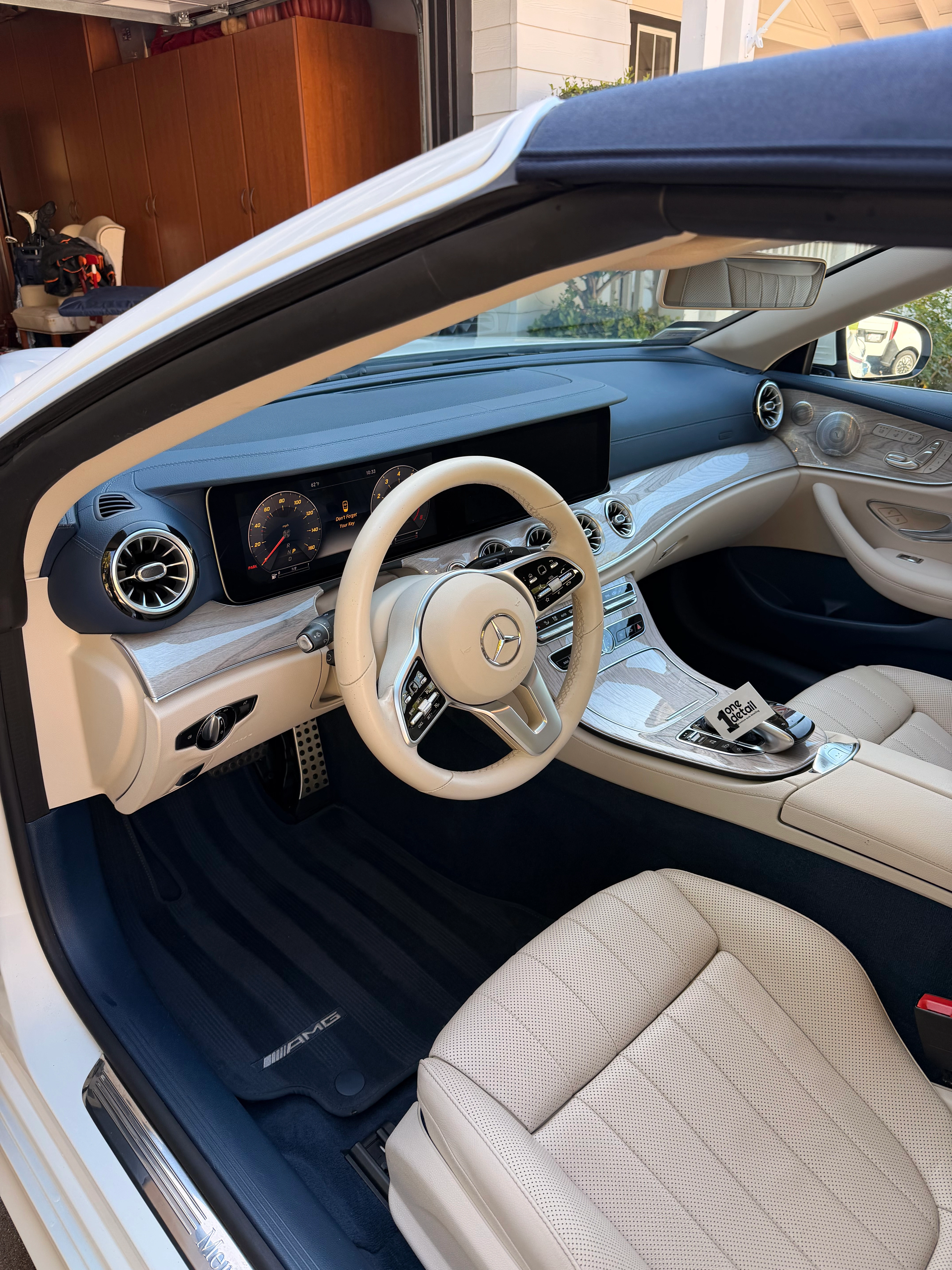 Detailed vehicle interior with polished dashboard and steering wheel